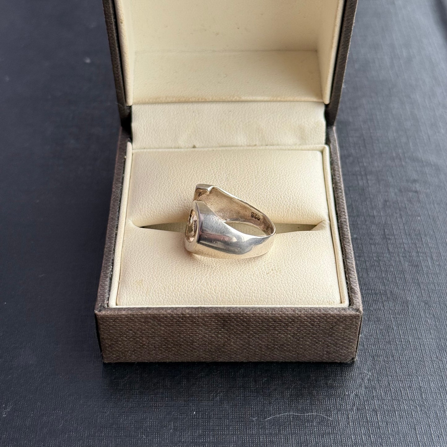 Sterling Silver Looping Ring.