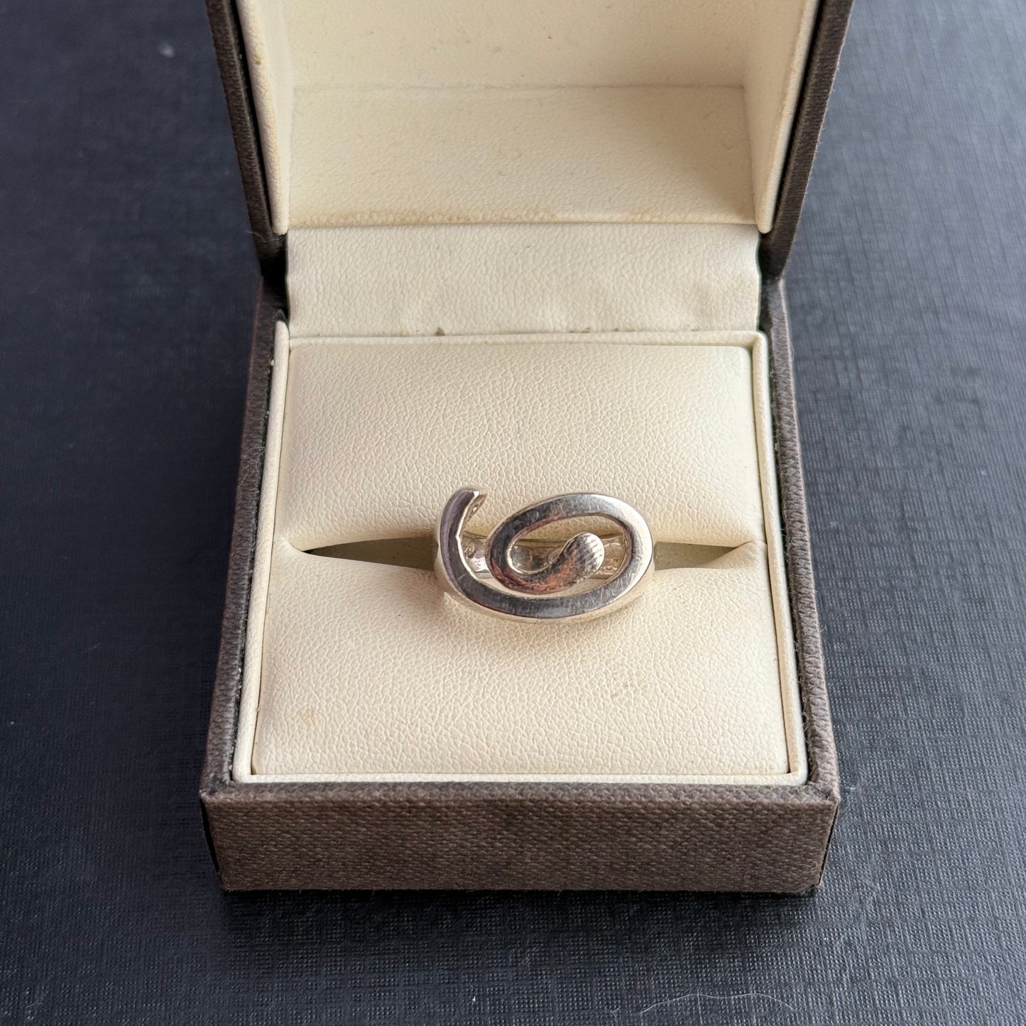 Sterling Silver Looping Ring.